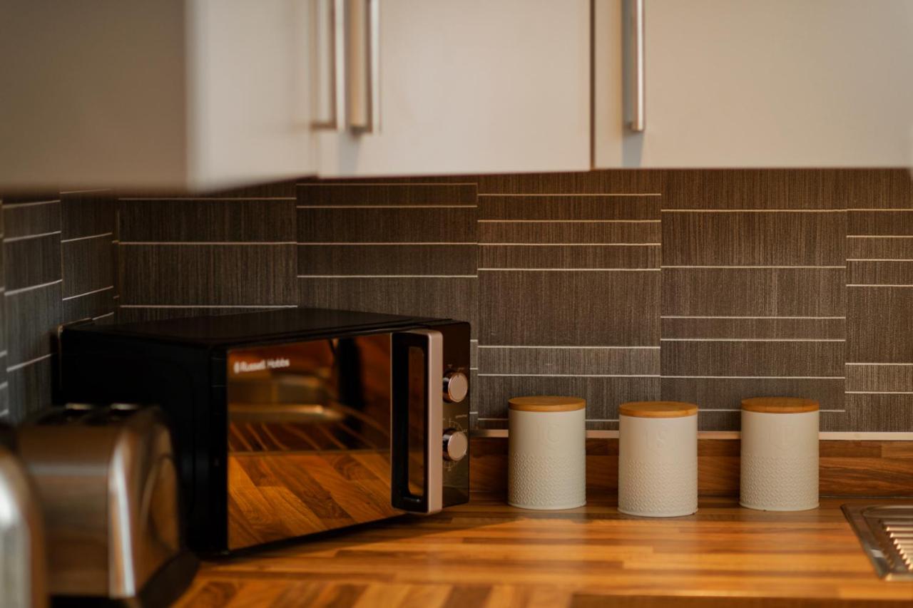 Compact kitchen with microwave in the self-catering apartment